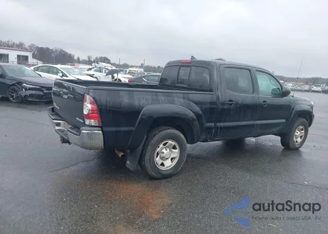 2015 Toyota Tacoma Base V6 z USA, uszkodzony, nr VIN 5TFMU4FN1FX031919